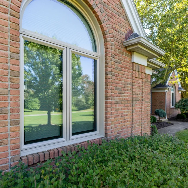 Casement with specialty shape window